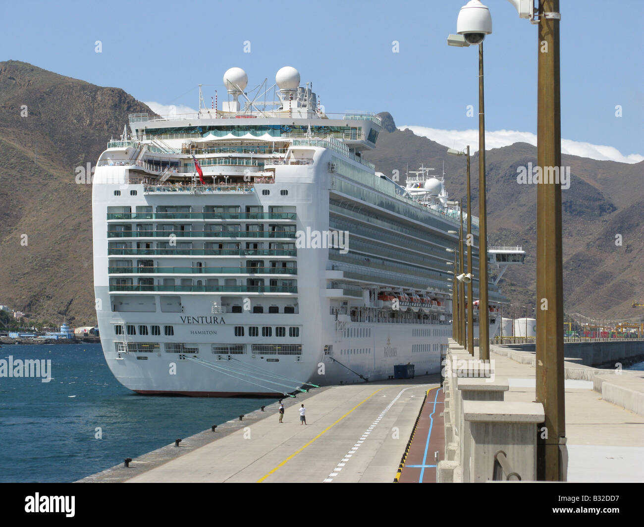 Stern of P&O cruise ship Ventura in Santa Cruz the capital of Tenerife in the Canary Islands (with people on the quay for scale) Stock Photo