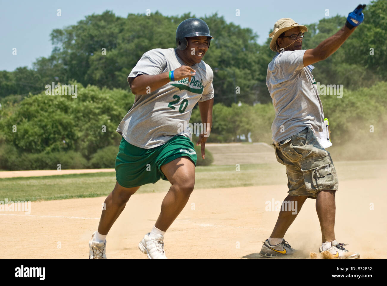 A coach directs his player to keep running the bases in a Special