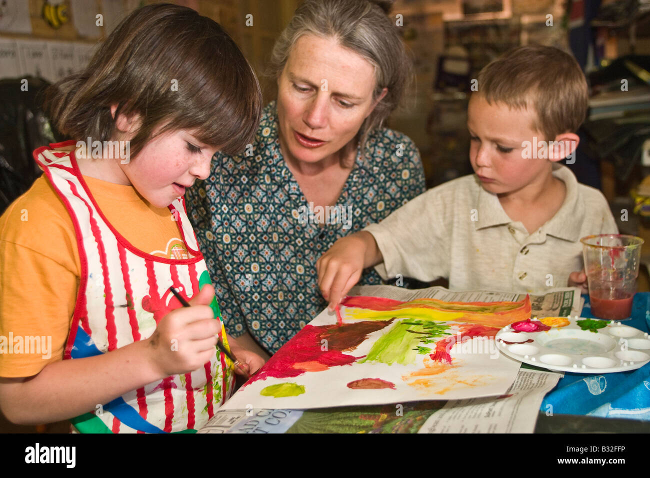 Children painting picture Stock Photo - Alamy