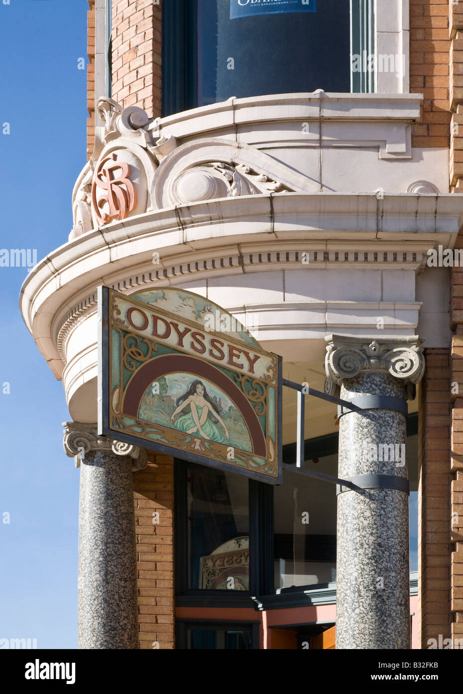ODYSSEY SIGN on a historic brick building on MAIN STREET in BOZEMAN MONTANA the gateway to Yellowstone National Park Stock Photo