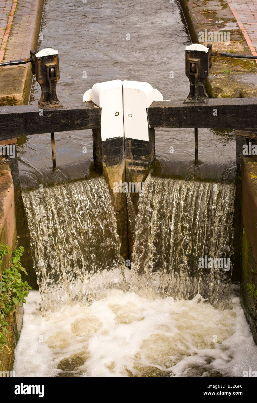 "water sluicing over lock gates Stock Photo Alamy