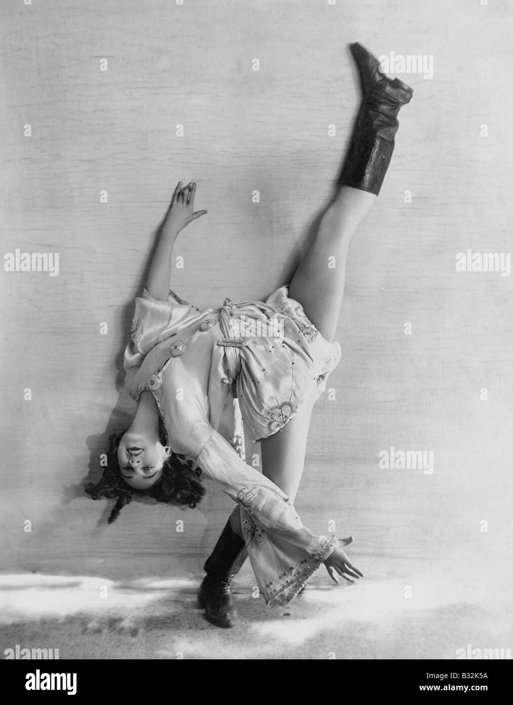 Flexible dancer bending over backwards Stock Photo