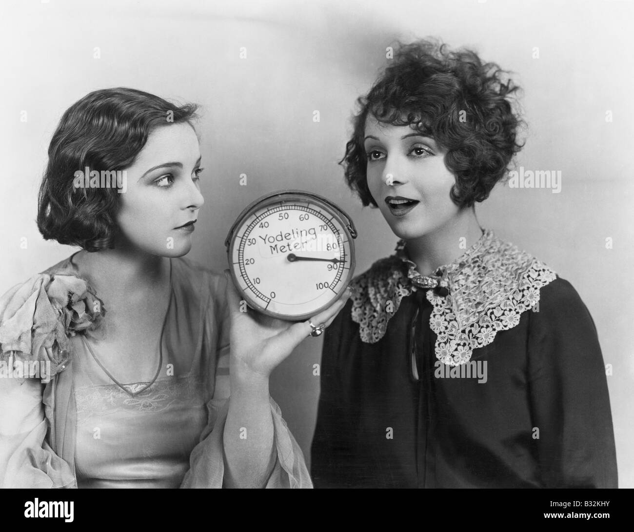 Women yodeling with yodeling meter Stock Photo