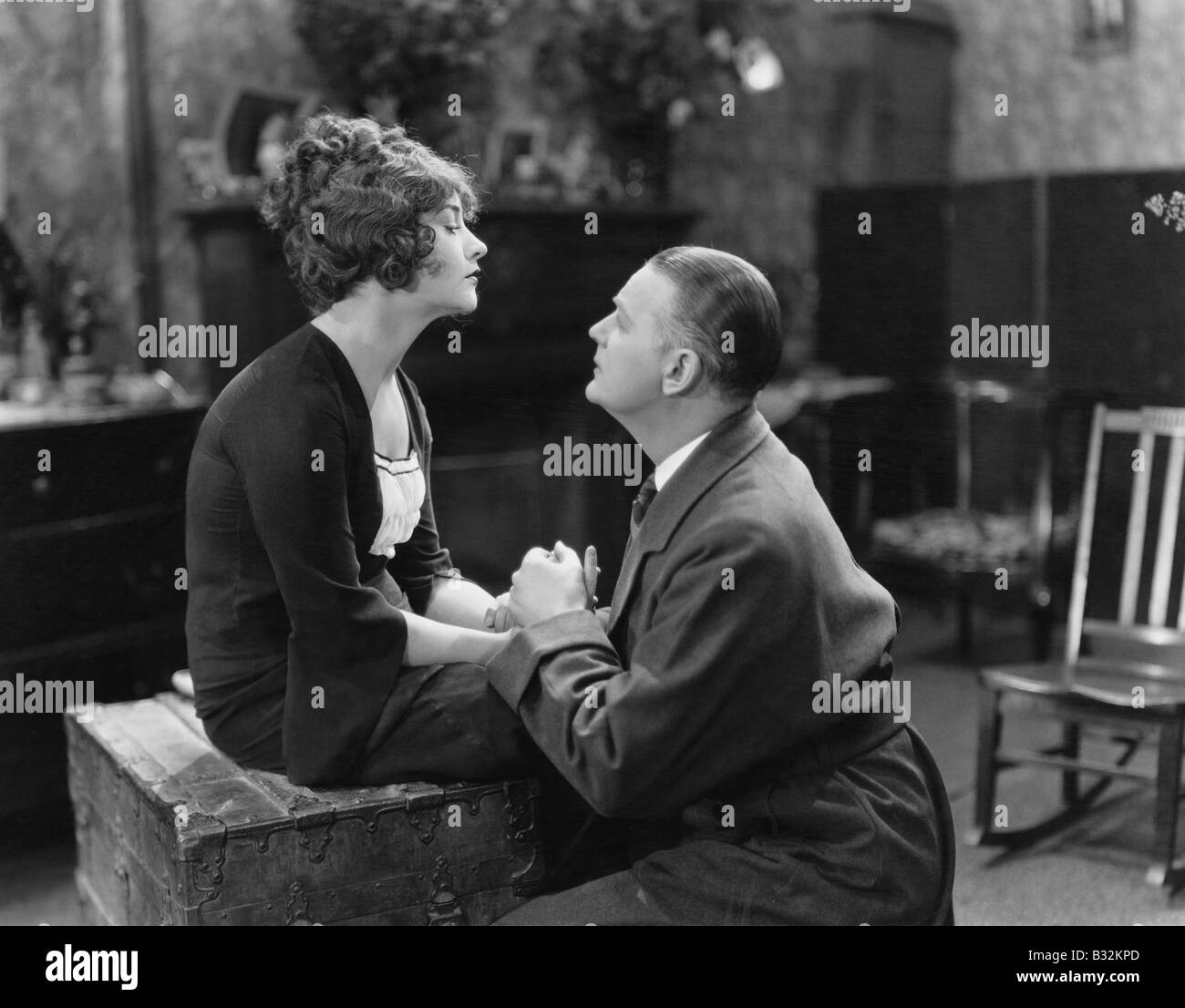 Man woman touching knees home hi-res stock photography and images - Alamy