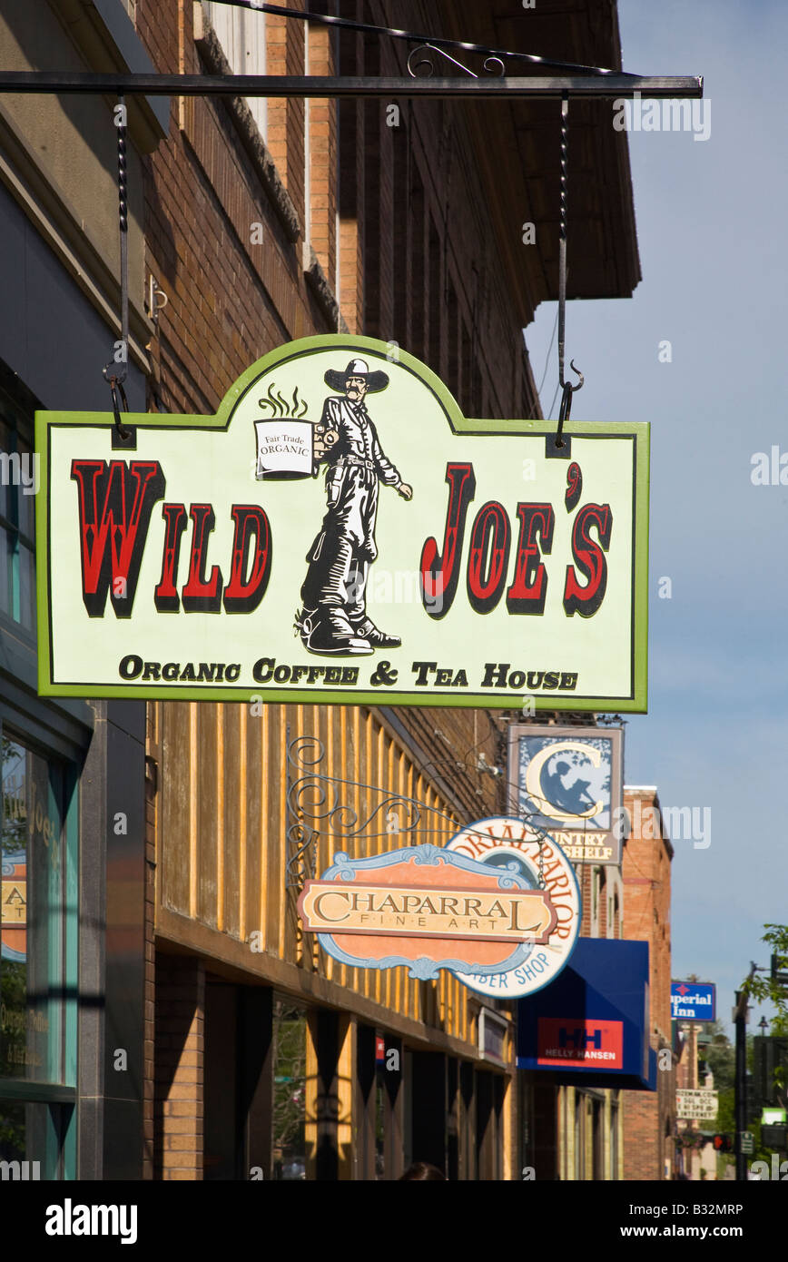 WILD JOES COFFEE SHOP SIGN on a historic brick building on MAIN STREET in BOZEMAN MONTANA the gateway to Yellowstone NP Stock Photo