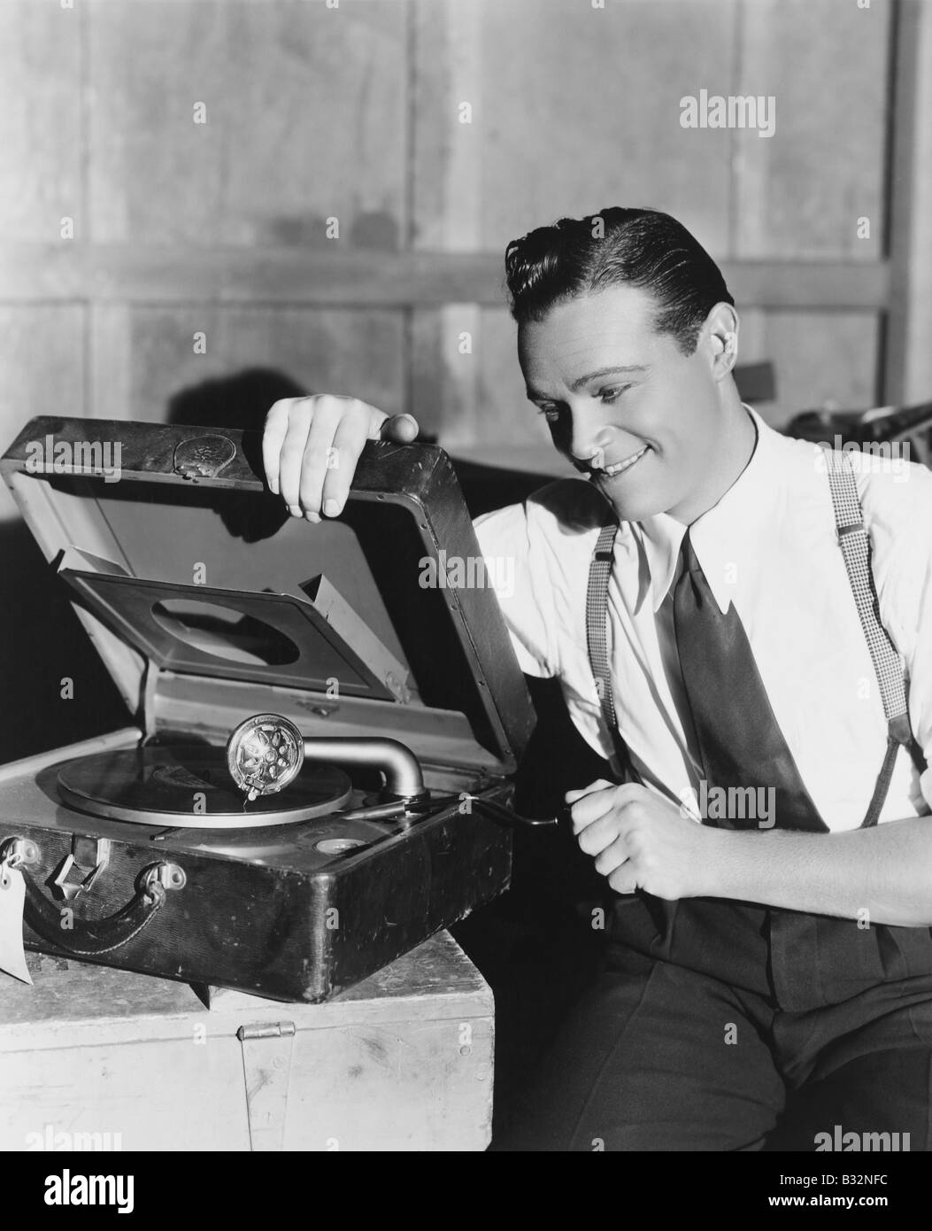 Man listening to record player Stock Photo Alamy