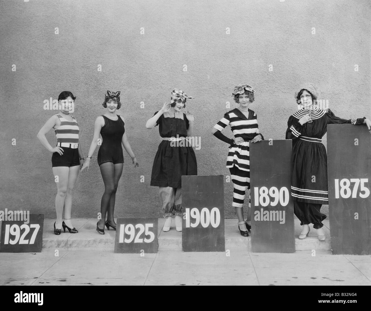 Women wearing fashions of different eras Stock Photo Alamy