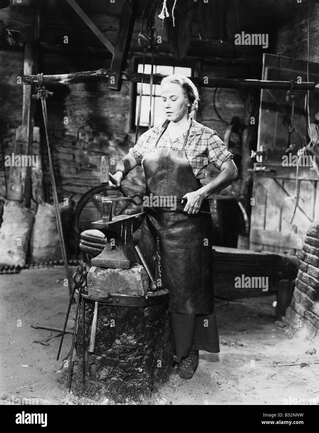 Female blacksmith Stock Photo