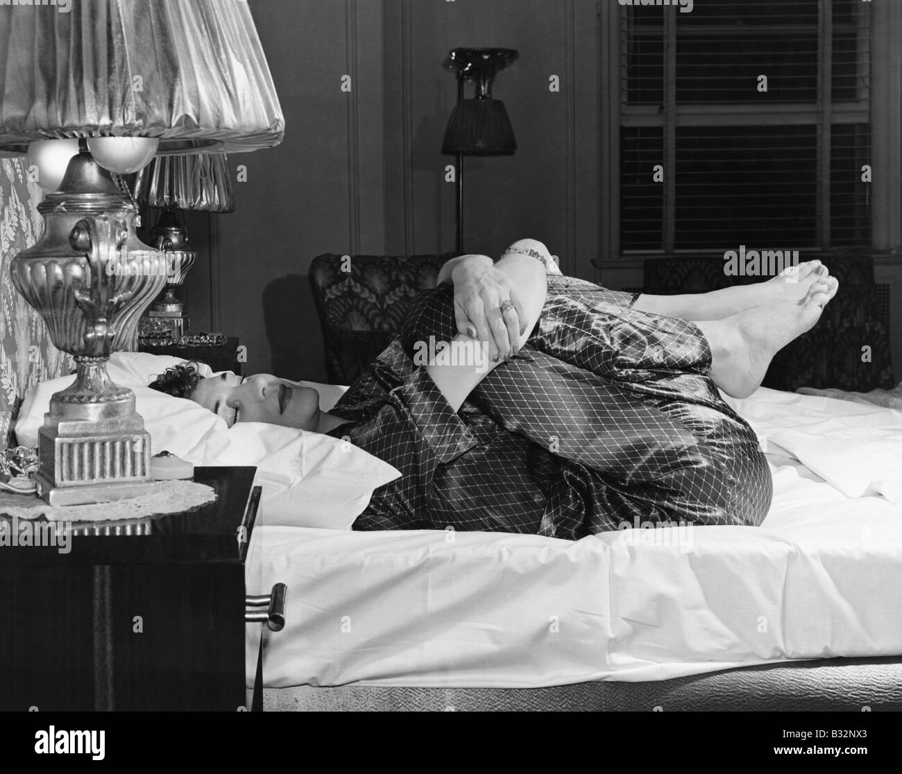 Fitness woman stretch on Black and White Stock Photos & Images - Alamy