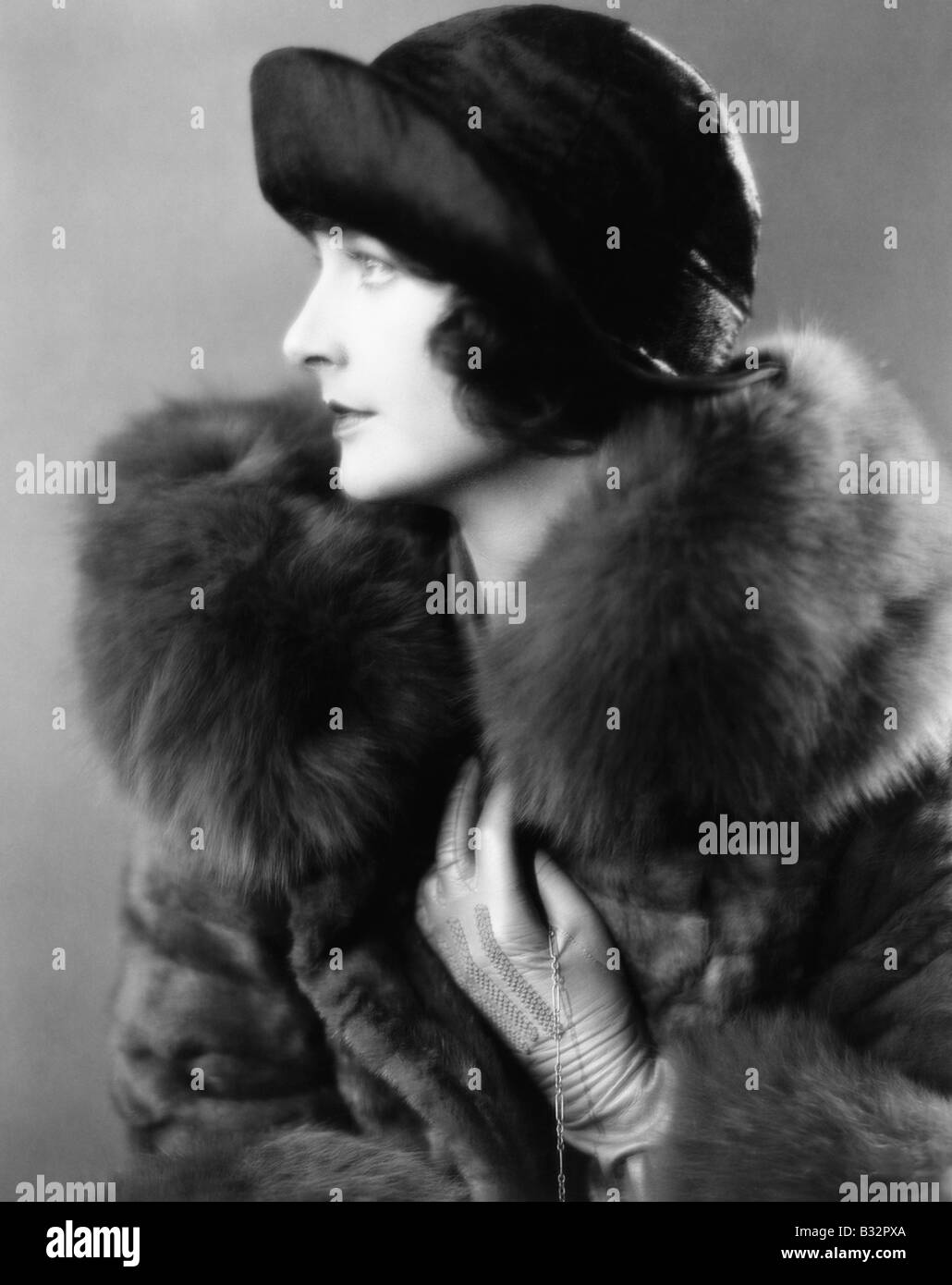 Young woman fur coat Black and White Stock Photos & Images - Alamy