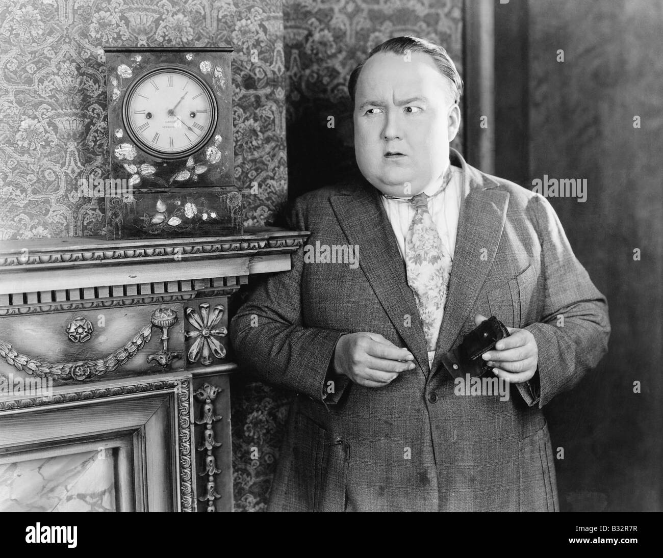 Man standing in a living room Stock Photo