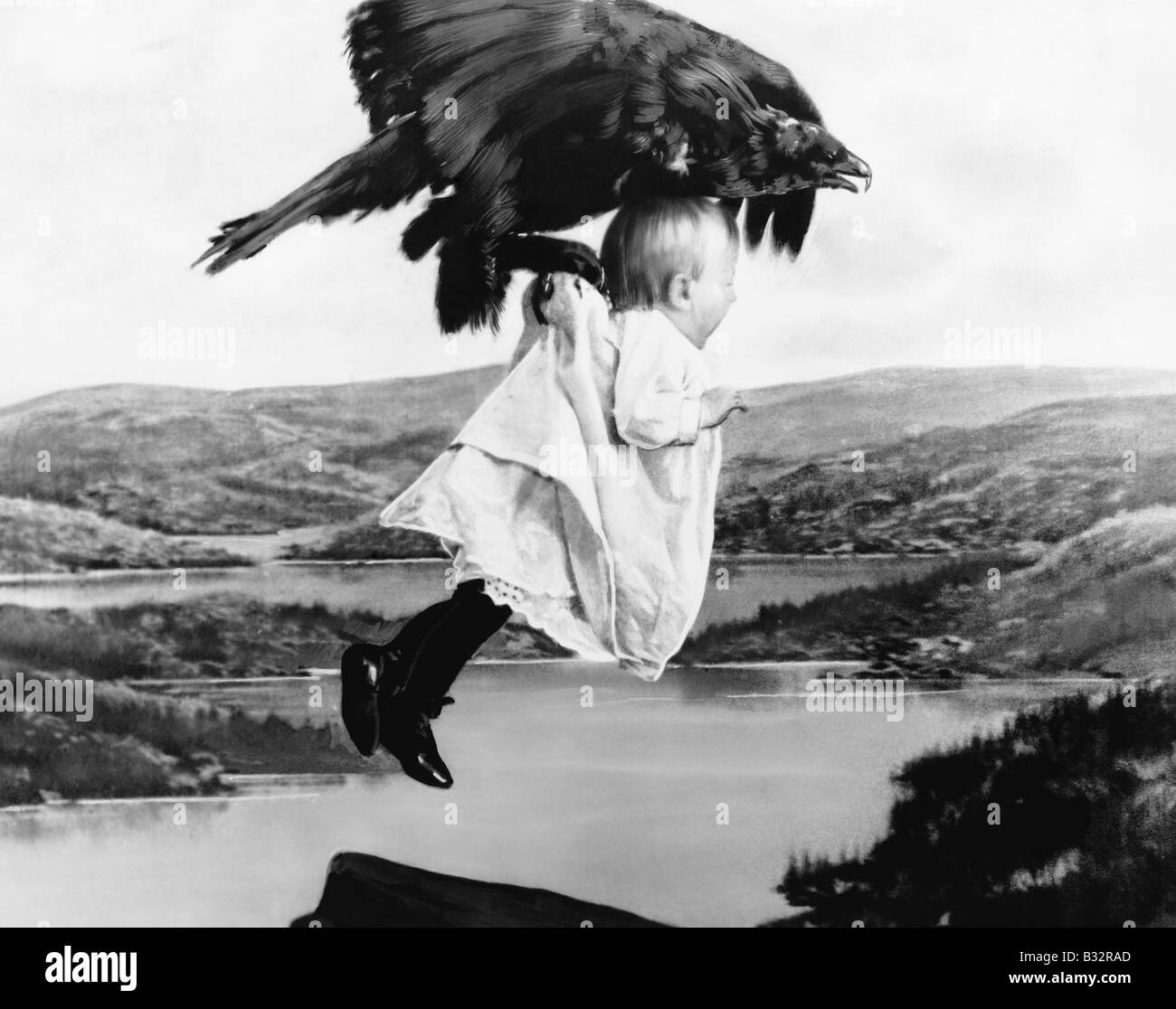 Baby being kidnapped by a vulture Stock Photo