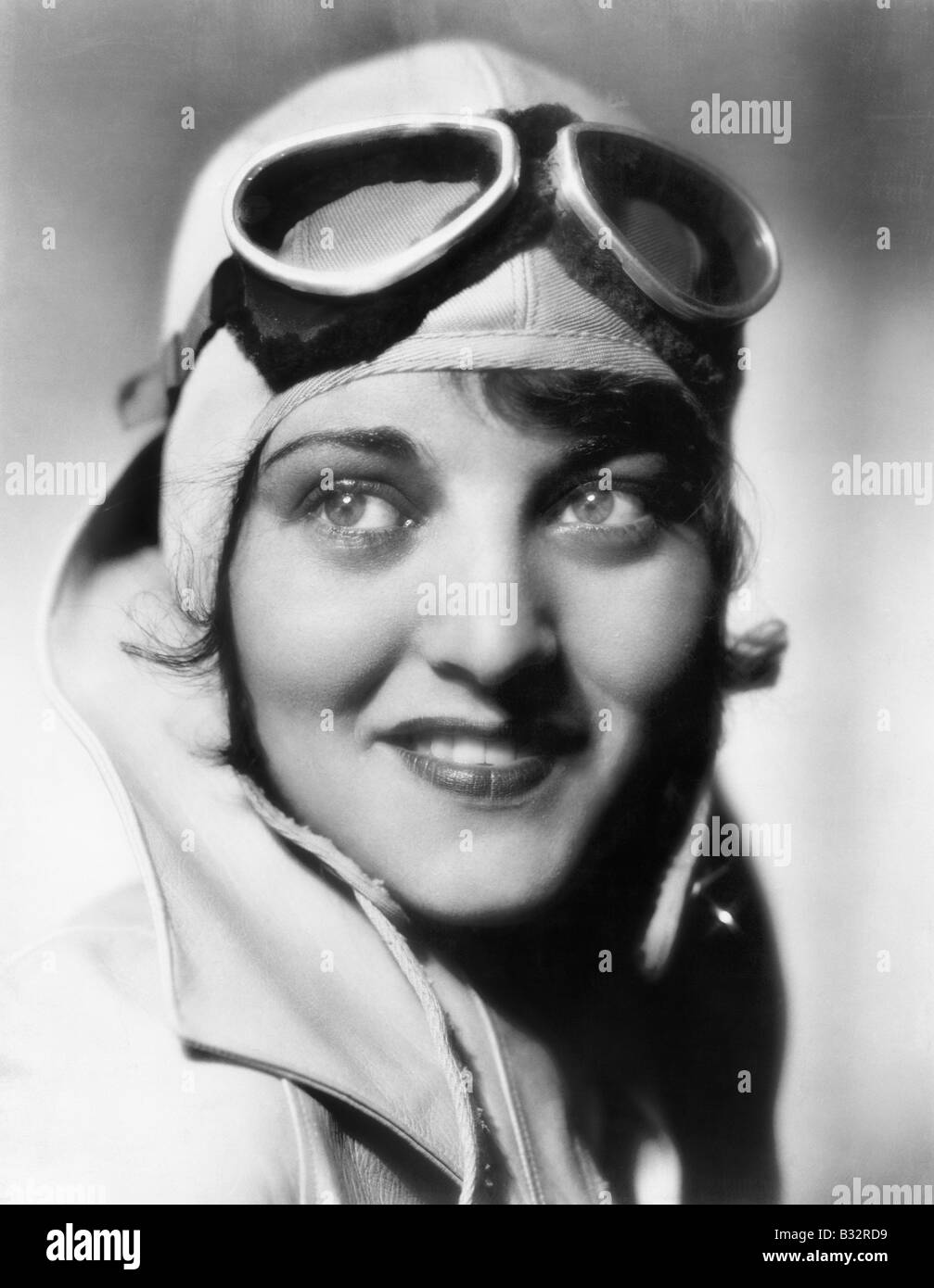 Woman with a pilots hat and goggles Stock Photo