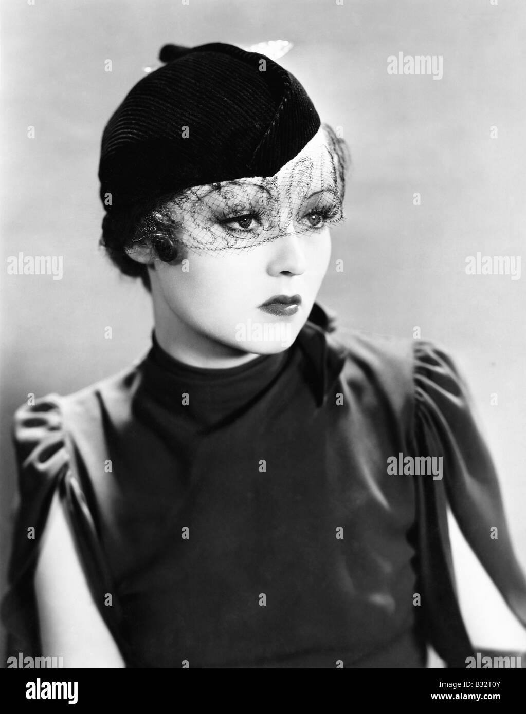 Portrait of a young woman wearing a veil Stock Photo - Alamy