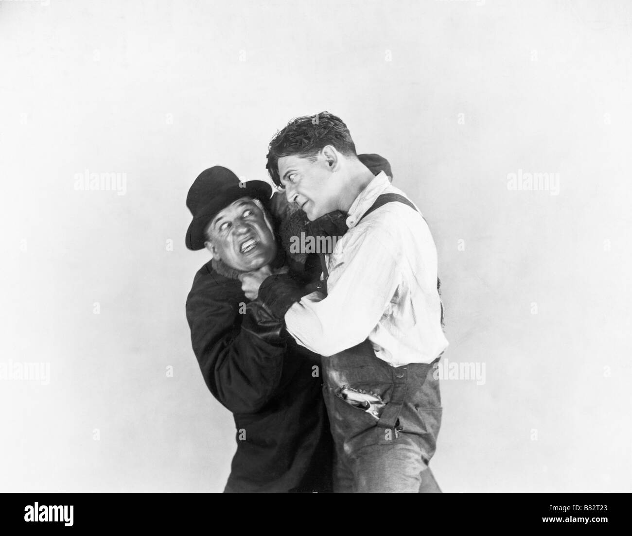 Two men fighting Black and White Stock Photos & Images - Alamy