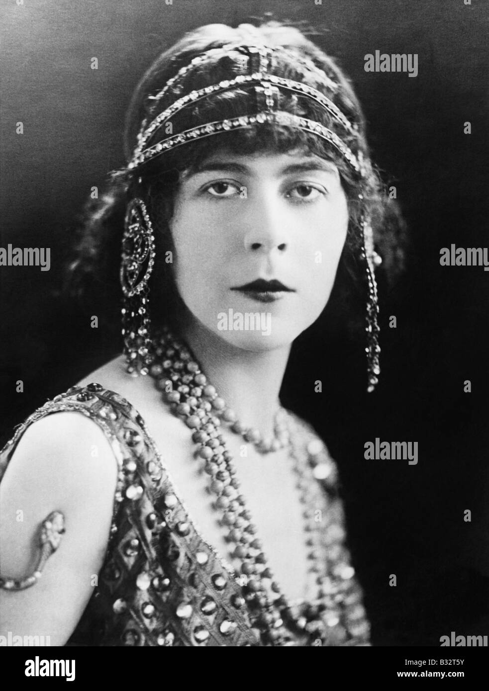 Portrait of a woman with ornate head jewelry Stock Photo