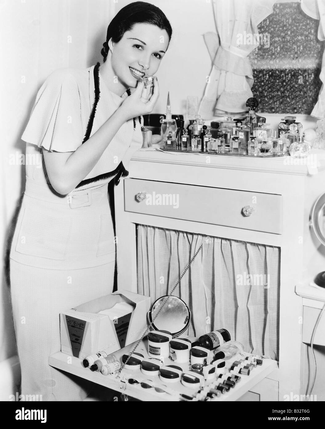 Retro woman mirror lipstick makeup hires stock photography and images