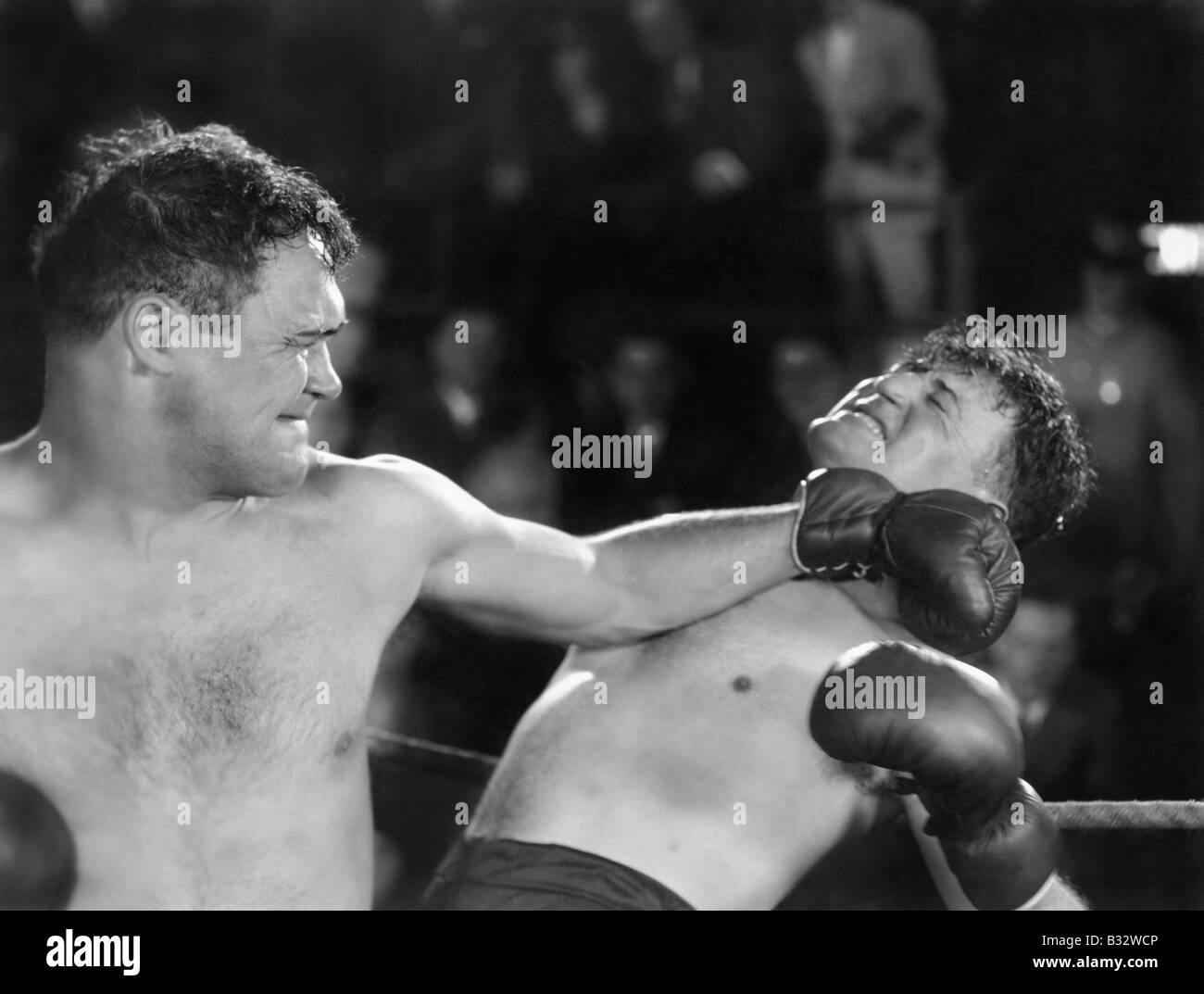 Boxer giving a punch Stock Photo Alamy
