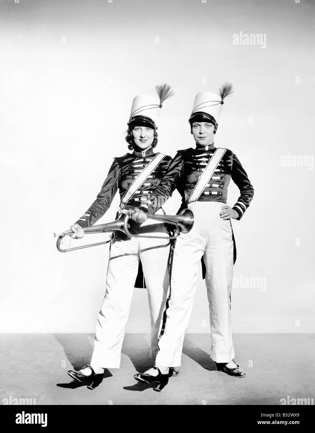 Two women toy soldiers ready for marching orders Stock Photo