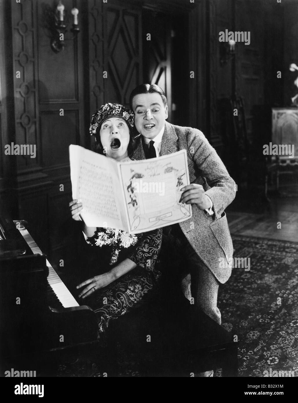 Couple singing together Stock Photo - Alamy