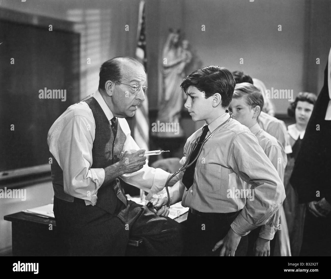 Children at school standing in line for inoculation Stock Photo Alamy