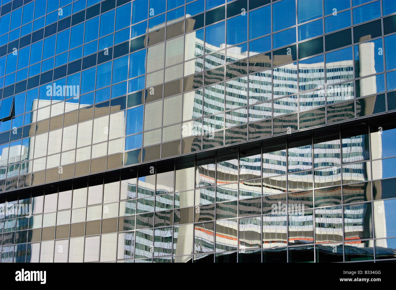 The UN CityCenter is reflected in a glass facade Stock Photo