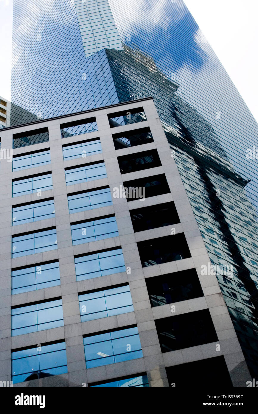 A tall skyscraper in the central business district of Singapore Stock Photo