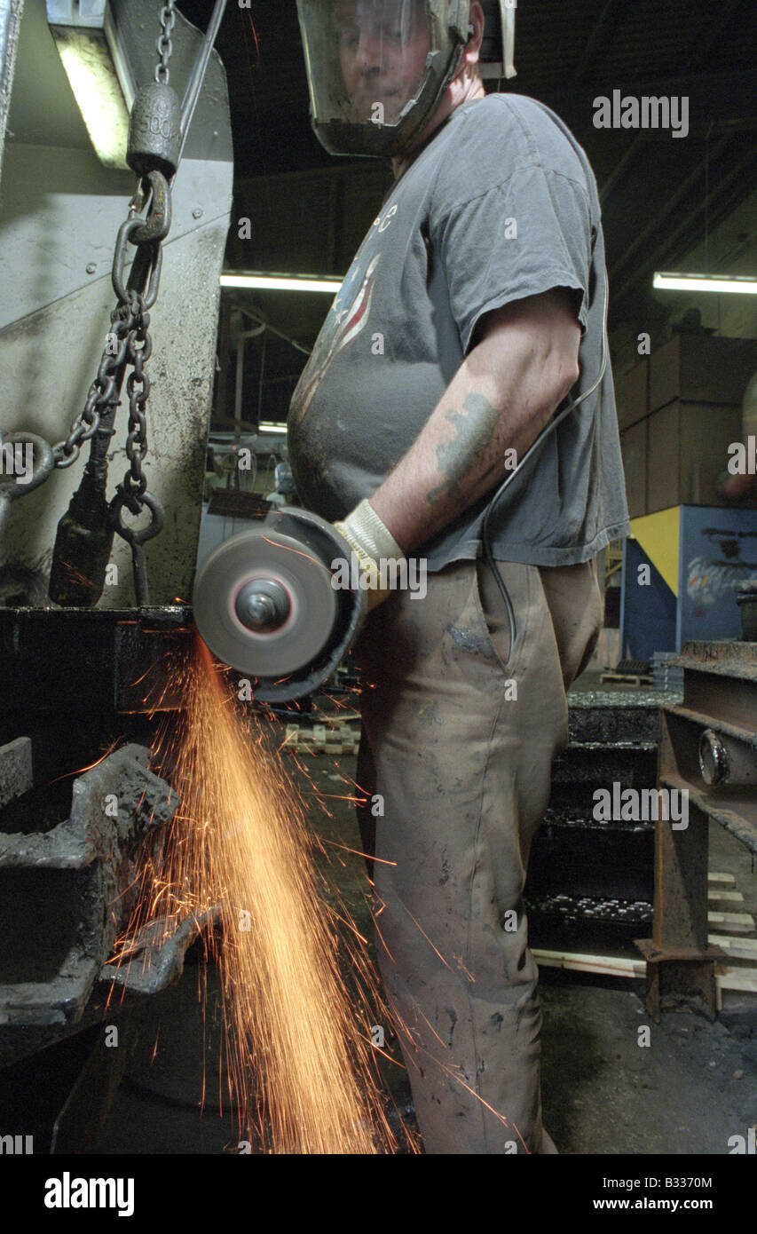 Workman Grinding Castings Stock Photo Alamy