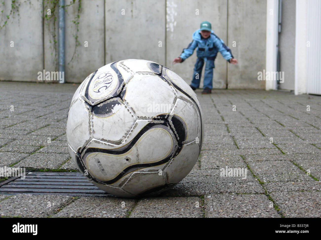 street football, ball and goal keeper Stock Photo