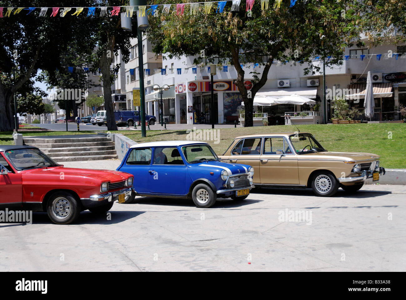Vintage cars Ford Mini and BWM Stock Photo