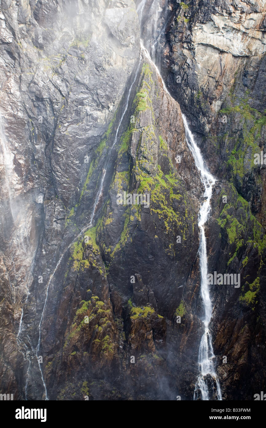 Waterfalls down the side of a Norweigan fjord. Stock Photo