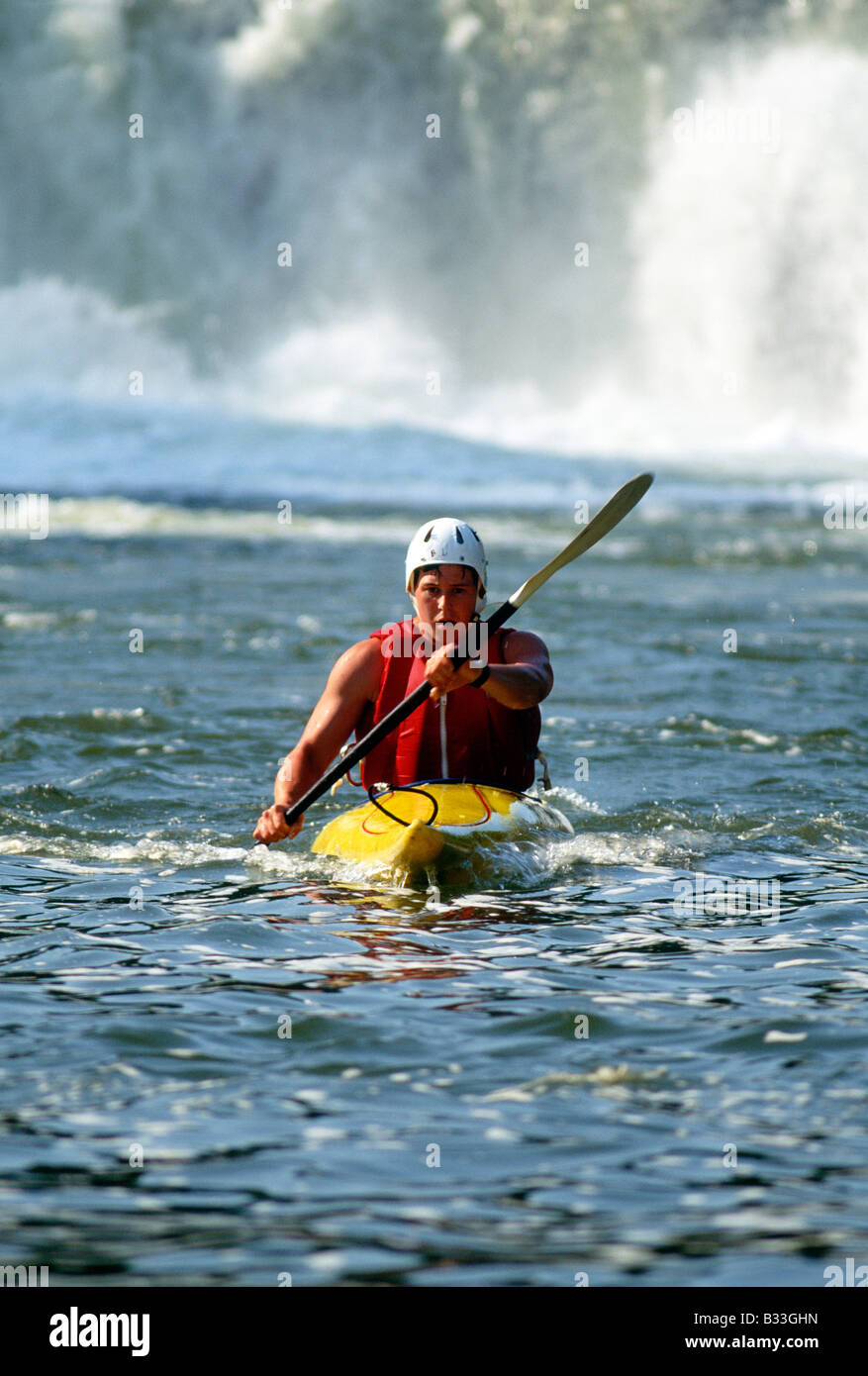 YOUNG MAN KAYAKING IN YOUGHIOGHENY RIVER, OHIOPYLE STATE PARK