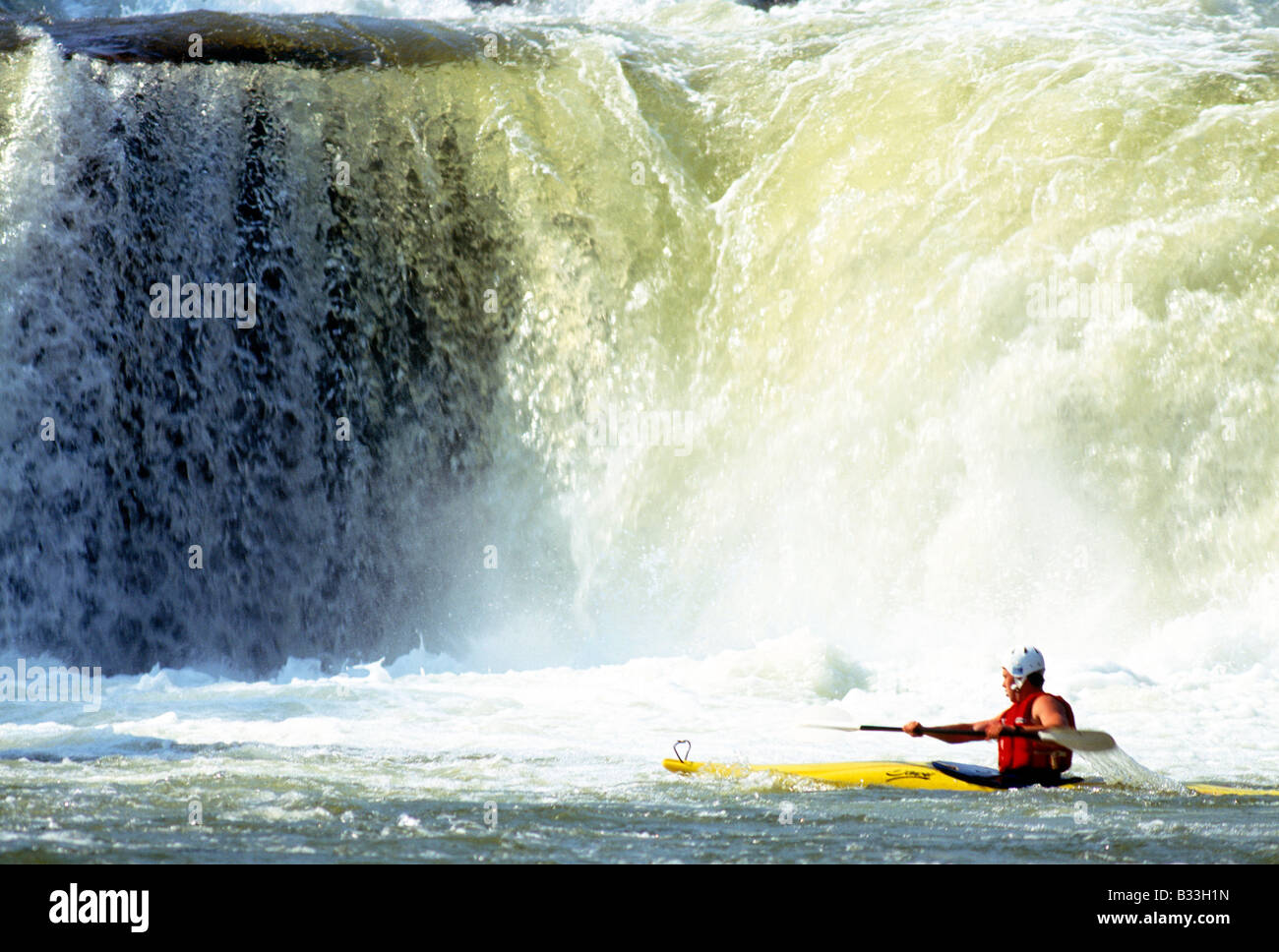 YOUNG MAN KAYAKING IN YOUGHIOGHENY RIVER, OHIOPYLE STATE PARK