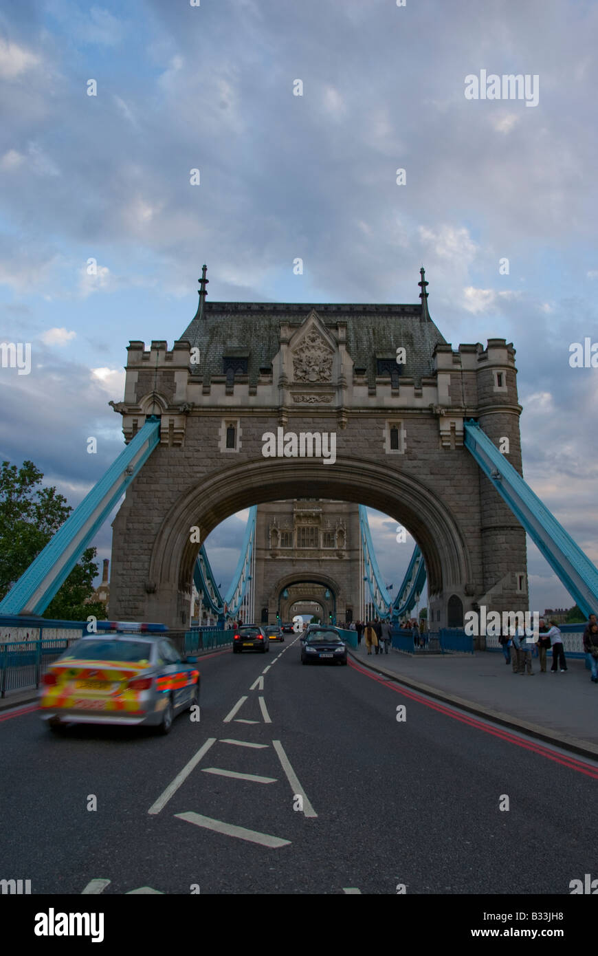 A police car driving to Towers bridge Stock Photo