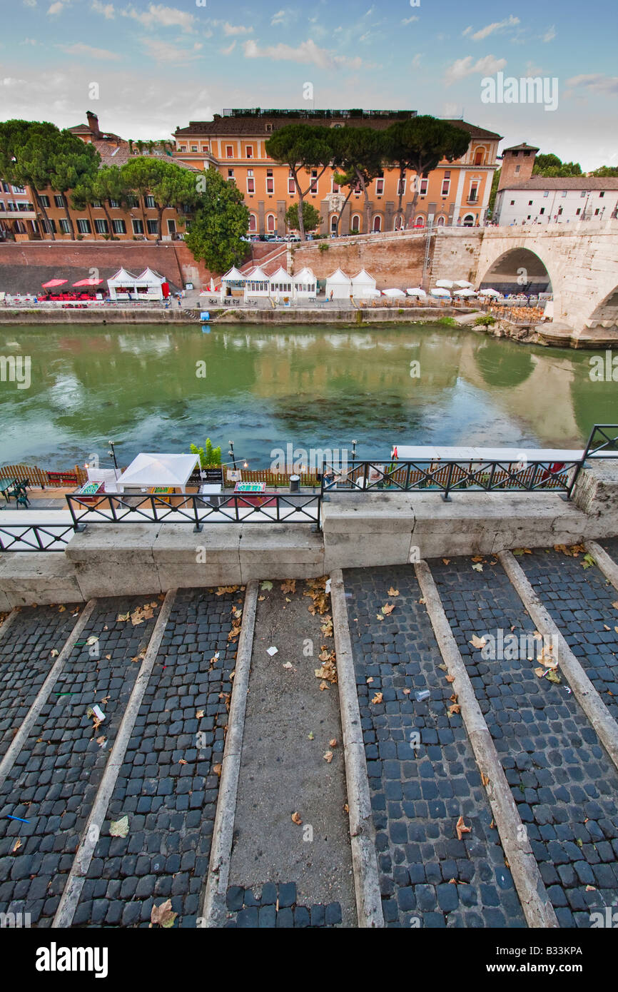 A view of the Tiberine Island from the stairs going down to the Tiber River in Rome, Italy. Stock Photo