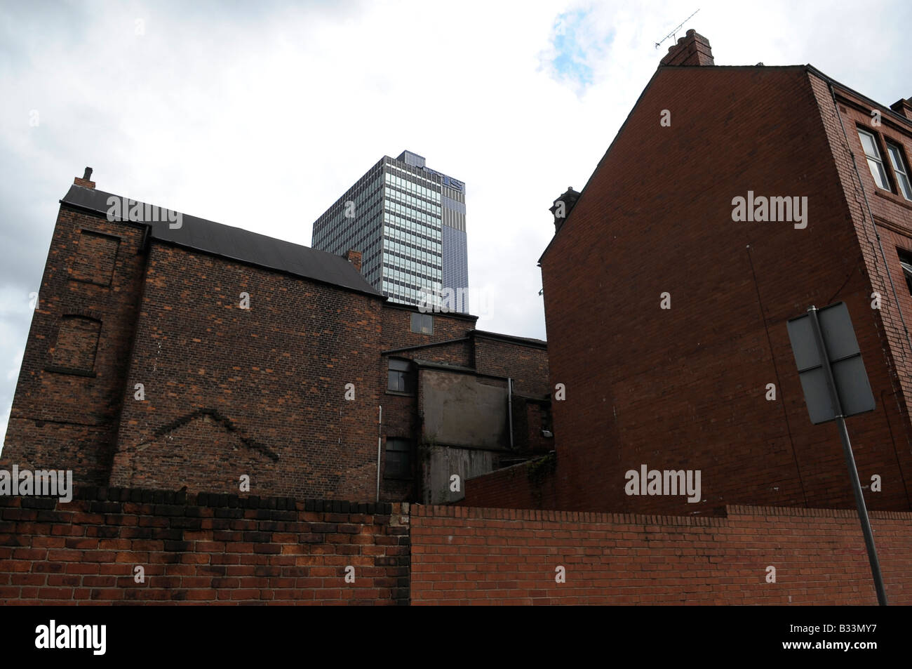 building architecture modern traditional red brick ducie bridge manchester city centre england uk britain clouds offices Stock Photo