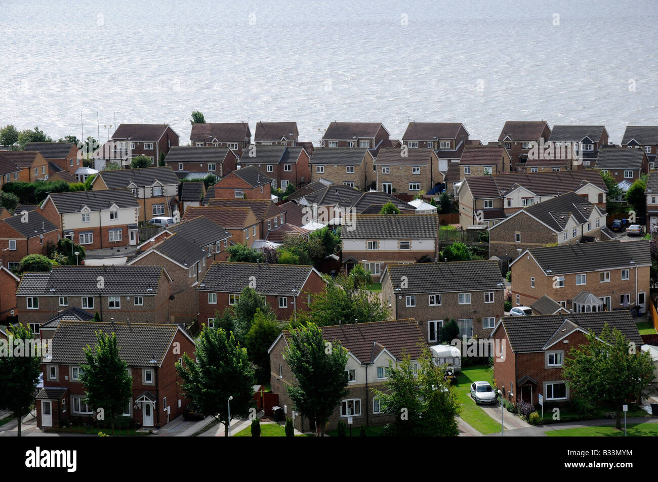 New Housing Development on the banks of the Humber Estuary, Hull, Humberside, Northern England Stock Photo