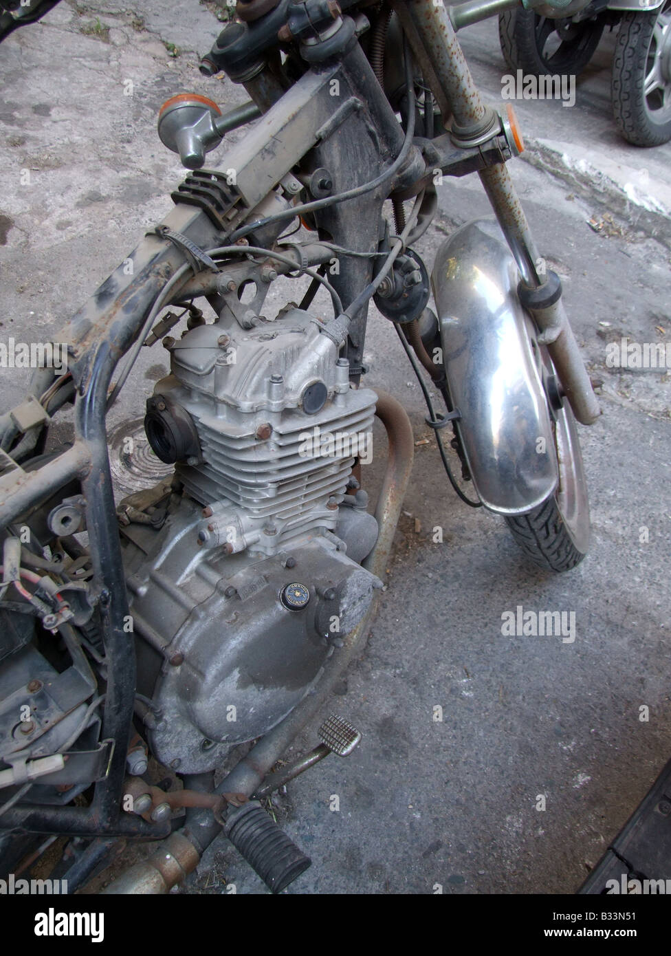 abandoned dismantled motorbike in street Stock Photo - Alamy