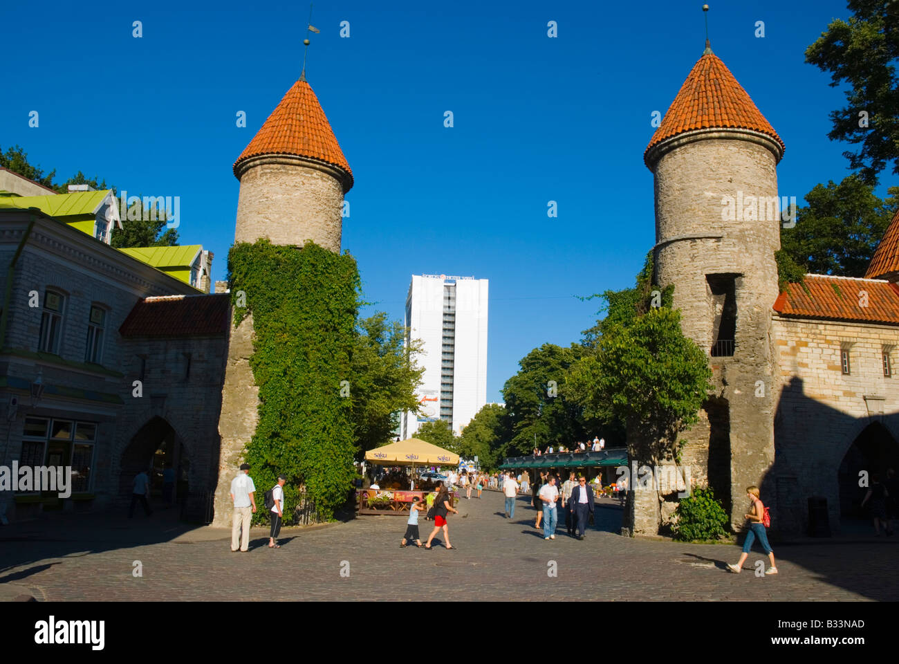 Gates to Old Town with Viru Hotel in the background in Tallinn Estonia Europe Stock Photo