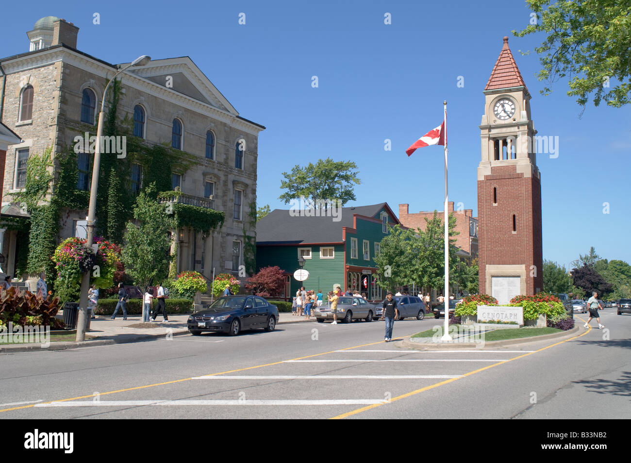 View of the main street of the village of Niagara on the Lake featuring the picturesque clock tower and old courthouse Stock Photo