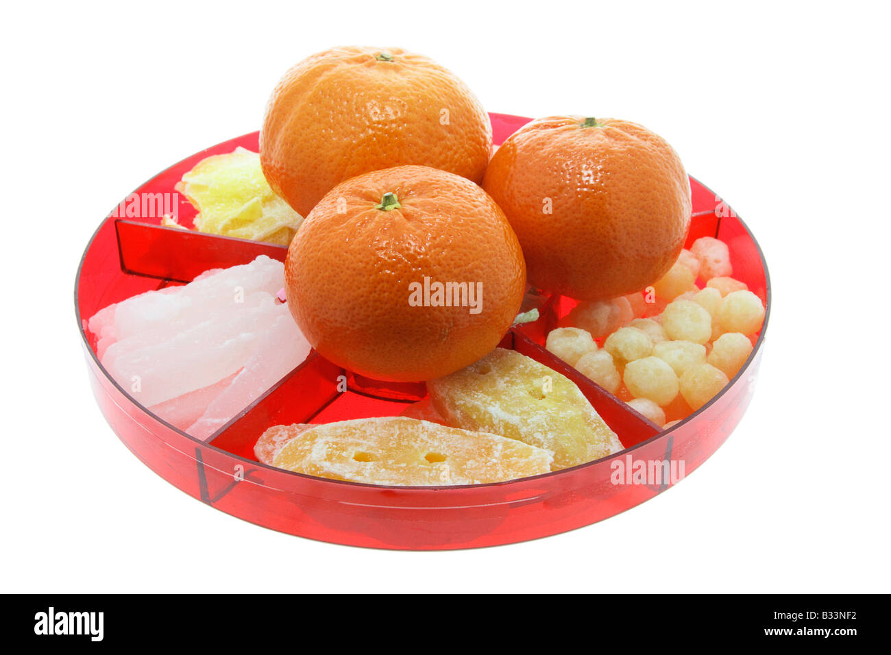 Mandarins and Chinese New Year Delicacies Stock Photo Alamy