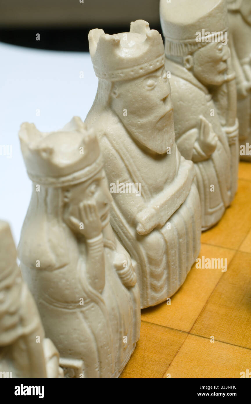 Viking style chess pieces on a chequered chess board Stock Photo Alamy