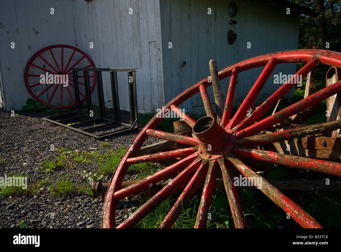 Red antique wooden wagons wheels Stock Photo Alamy