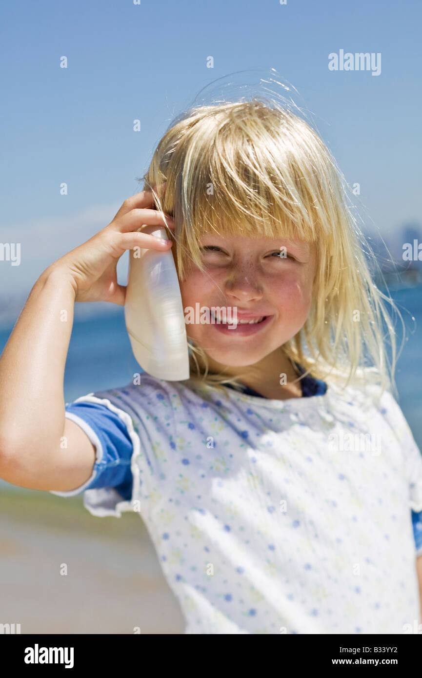 Child shell ear hi-res stock photography and images - Alamy