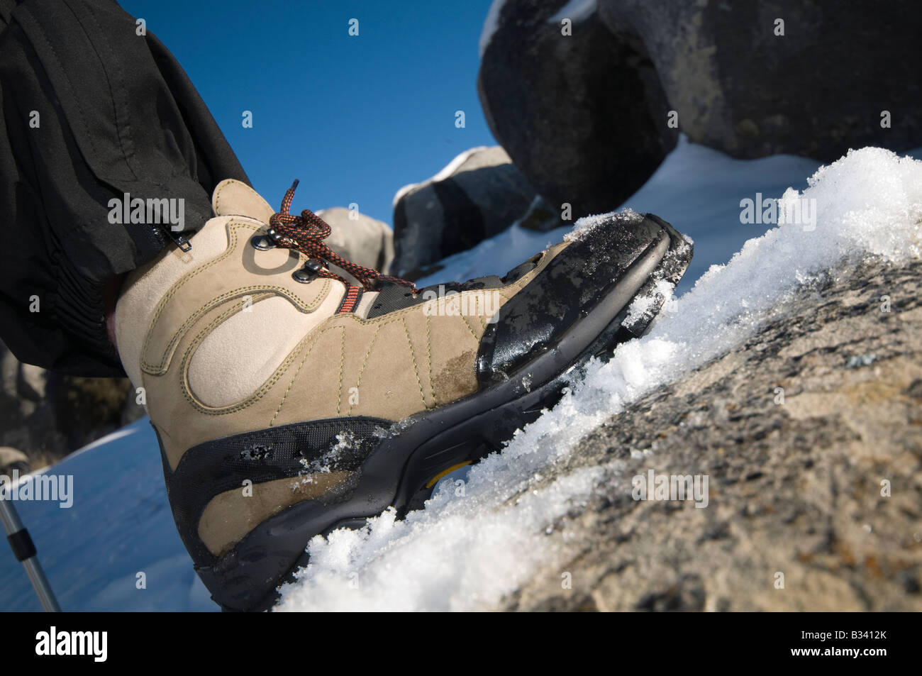 Hiking boot in the snow Stock Photo Alamy