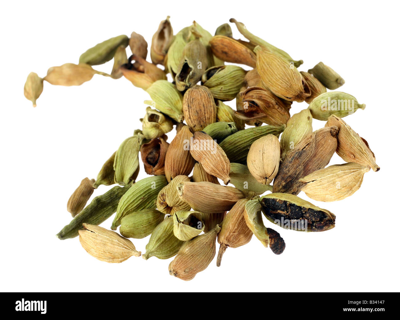 Cardamom green and brown seed spice on white Stock Photo Alamy
