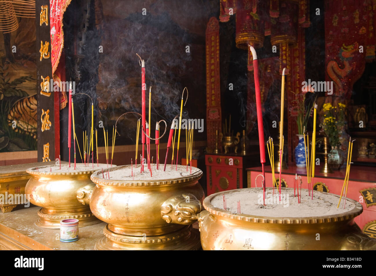 Incense sticks in vietnamese temple hi-res stock photography and images ...