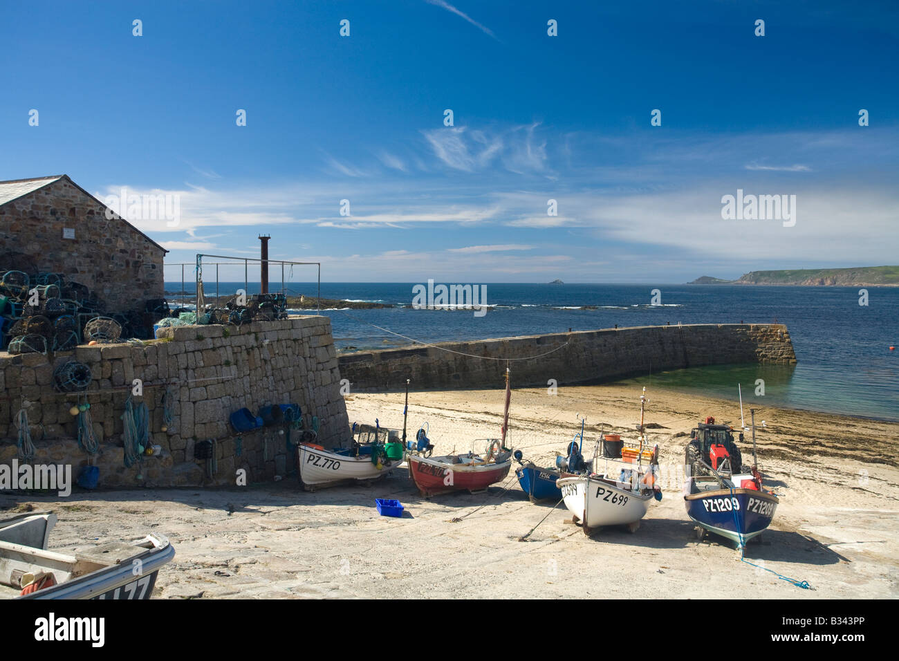 Sennen Cove harbour harbor in summer sunshine sea of Atlantic Ocean Cornwall West Country England UK United Kingdom GB Great Stock Photo