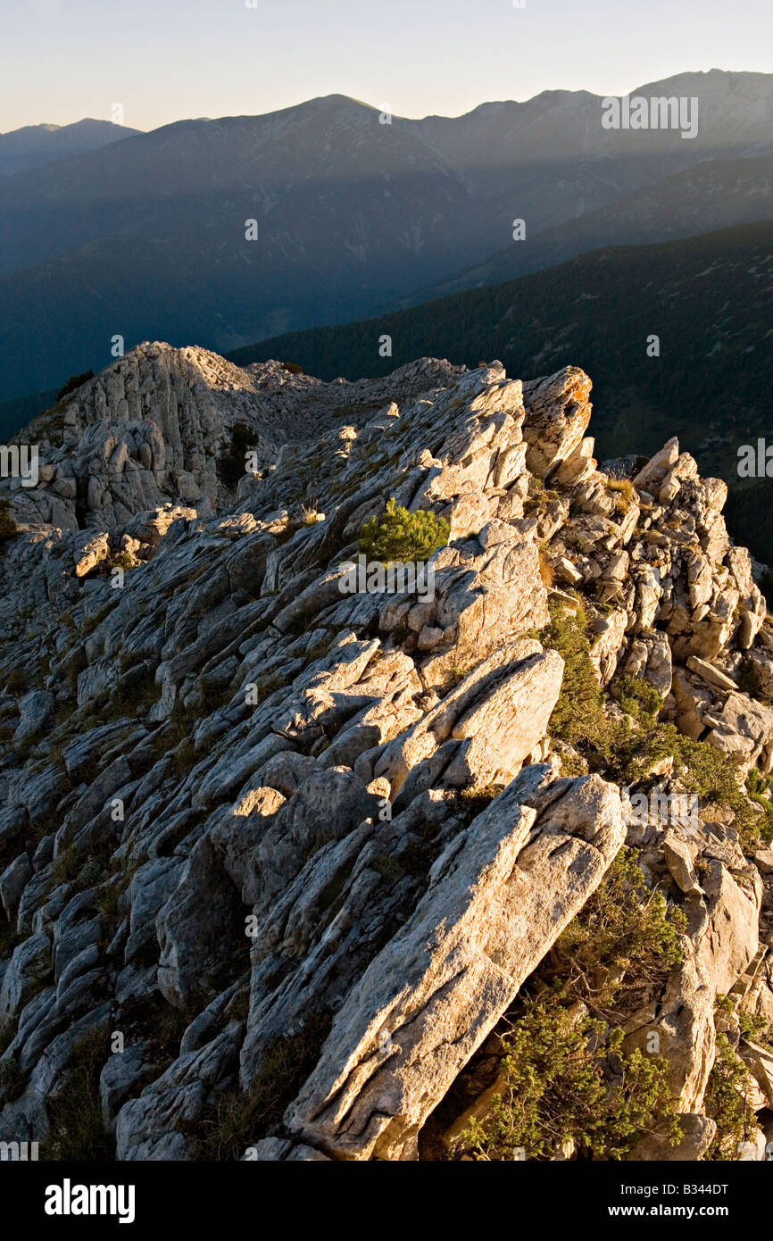 Early morning light on Sinanitsa mountain cliffs in World Heritage Site Pirin National Park Bulgaria Stock Photo