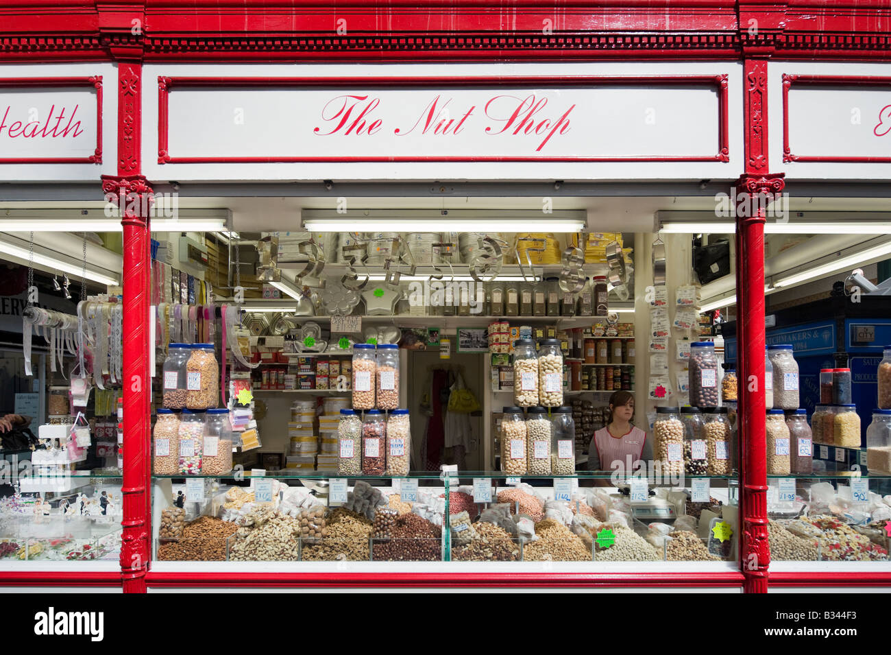 Stall selling nuts in the Edwardian Kirkgate Market, Leeds, West Yorkshire, England Stock Photo